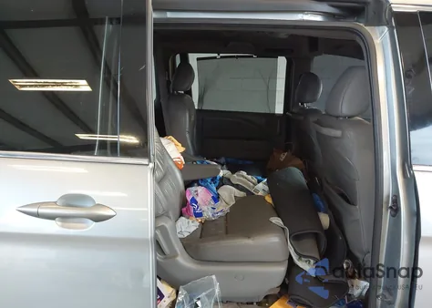 2010 Honda Odyssey Ex-L from USA, damaged, VIN 5FNRL3H70AB042009